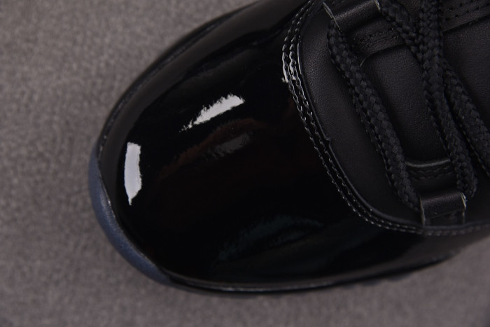 Comme des Garçons x Air Jordan 11 “Triple Black” IV7639-001